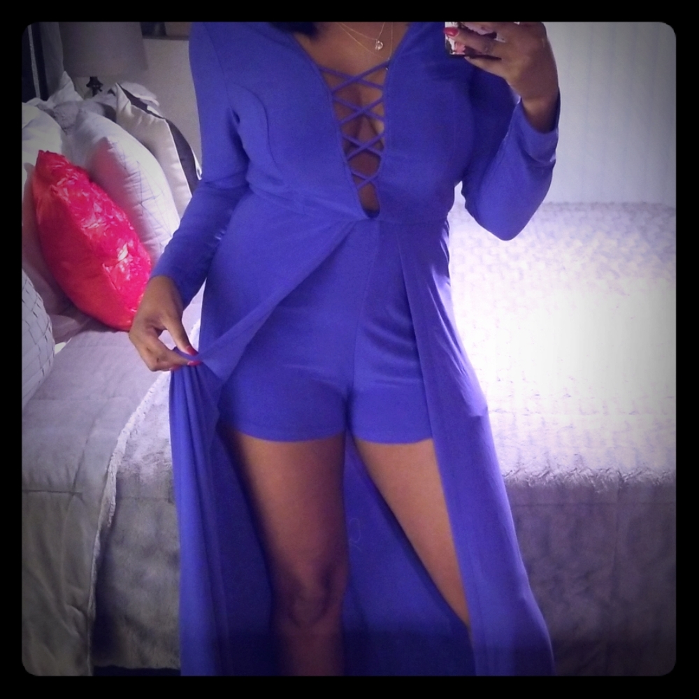 A long sleeve romper dress by Charlotte Russe